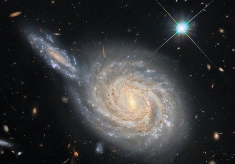 تصویر باشکوه هابل از برخورد دو کهکشان
