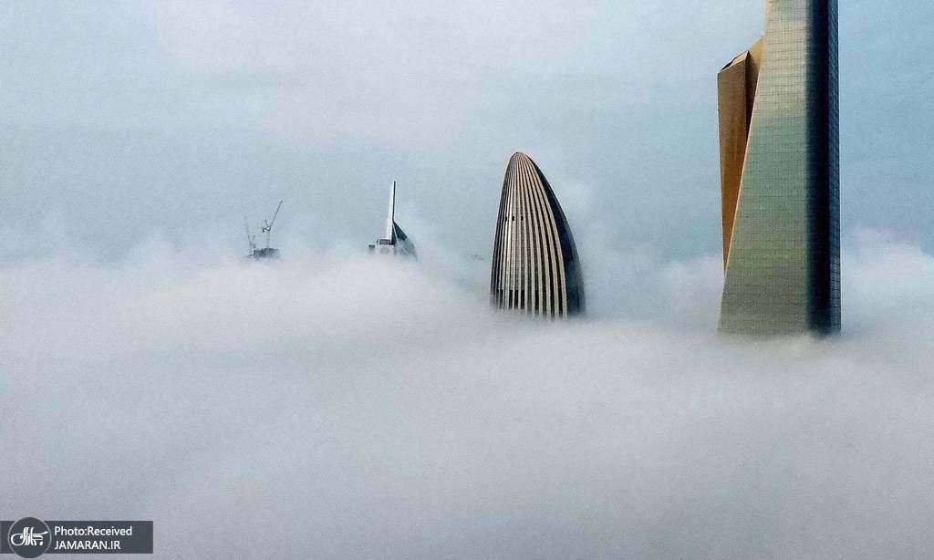 برج های کویت در مه شدید فرو رفت+عکس