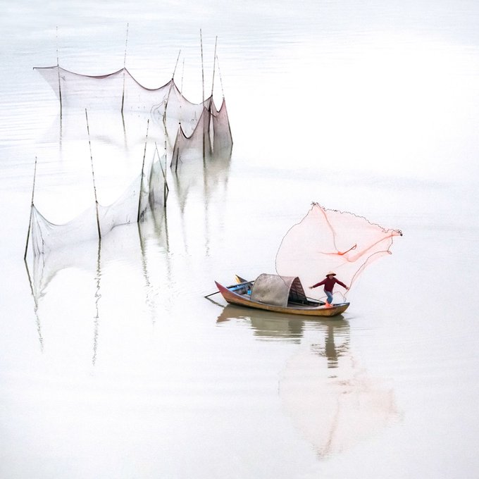 تصویر جذاب از یک ماهیگیر چینی+عکس