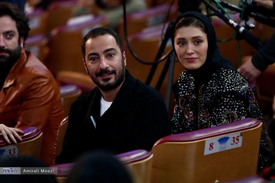 نوید محمدزاده و همسرش در اختتامیه جشنواره فجر+عکس