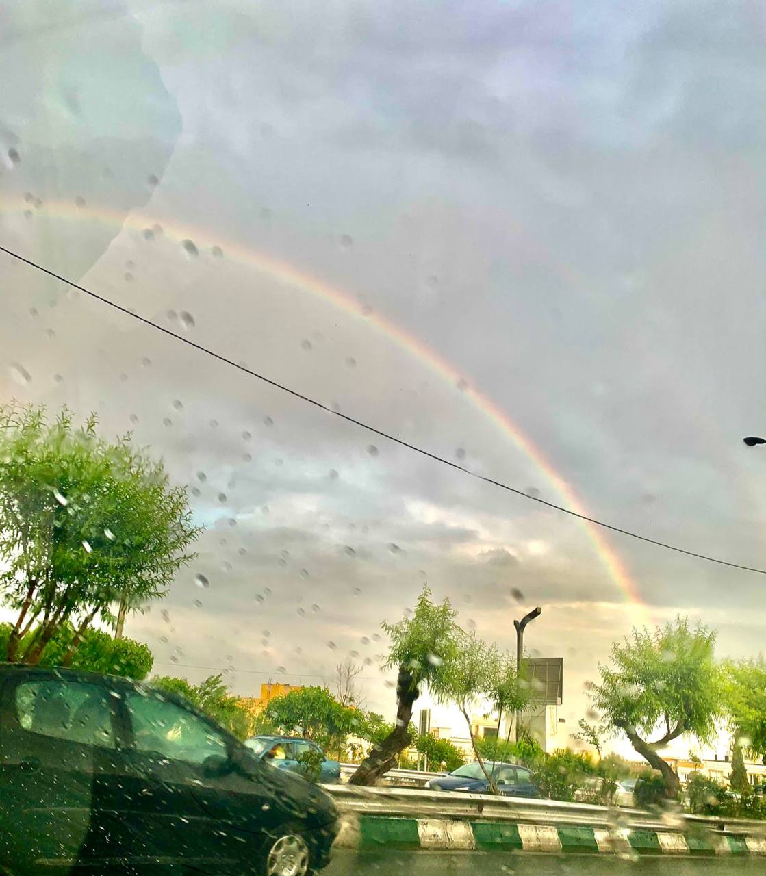 رنگین کمان دیدنی پس از باران در تهران+عکس
