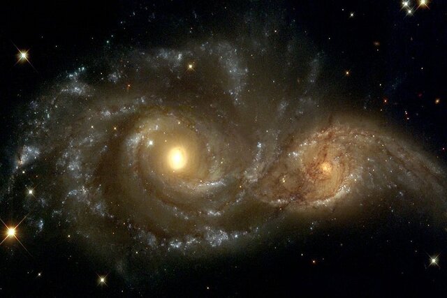 لحظه برخورد دو کهکشان با یکدیگر+عکس