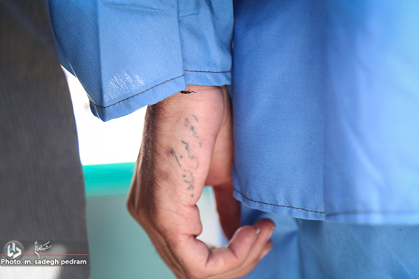تتو نوشته عجیب روی بدن مجرم پایتخت+عکس