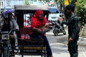  برخورد گشت ارشاد اندونزی با زنان بدحجاب! +عکس