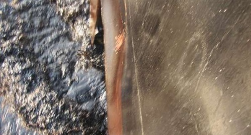محل اصابت موشک روی بدنه نفت‌ کش ایرانی +عکس