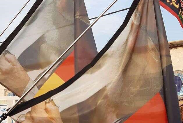 تصویر رهبر انقلاب روی پرچم آلمان +عکس