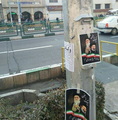 بازداشت پخش کننده پوسترهای خیابان انقلاب+عکس