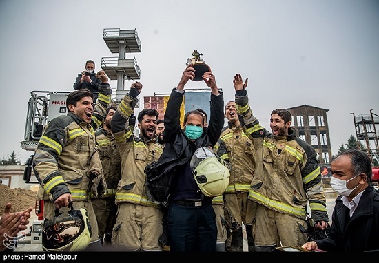 مسابقه سنگین میان آتش نشانان تهران+عکس