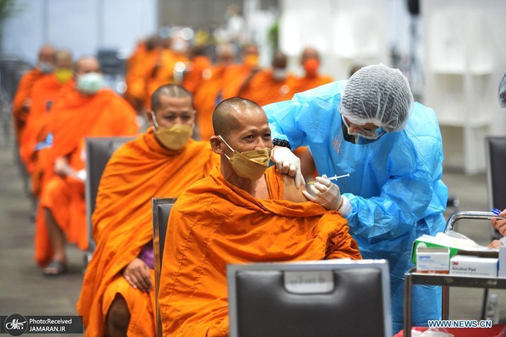 چهره یک بودایی هنگام تزریق واکسن کرونا+عکس